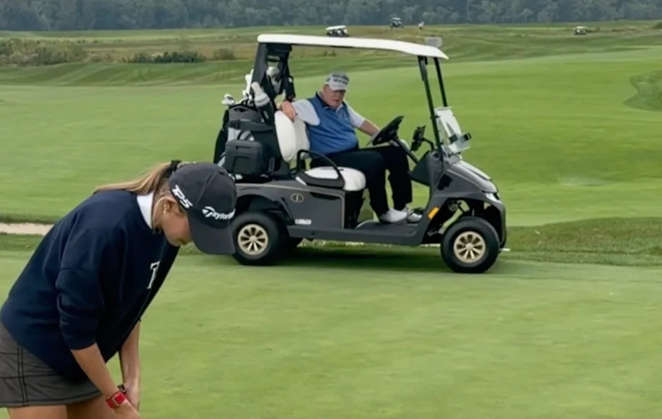 President Trump driving a cart on the course.Kai Trump&sol;IG