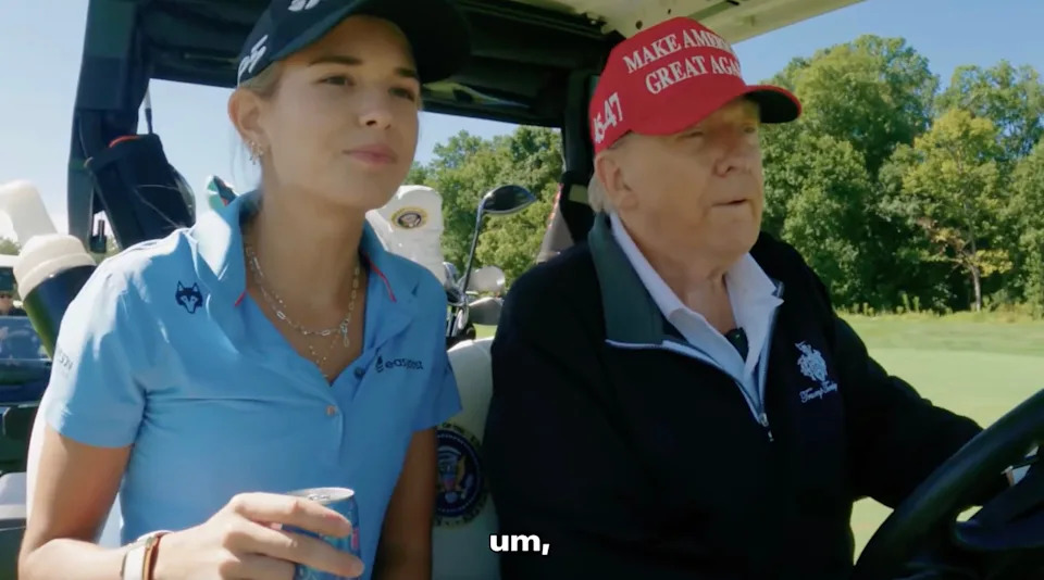 Donald Trump golfing with granddaughter Kai Trump. / screen grab