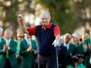 FILE - Jack Nicklaus waves before hitting the first tee for the honorary tee off before the first round of the Masters golf tournament, April 9, 2015, in Augusta, Ga.