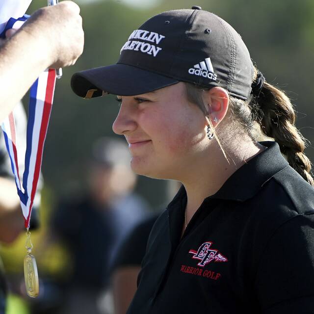 8914605_web1_ptr-WPIALGirlsGolf03-100225