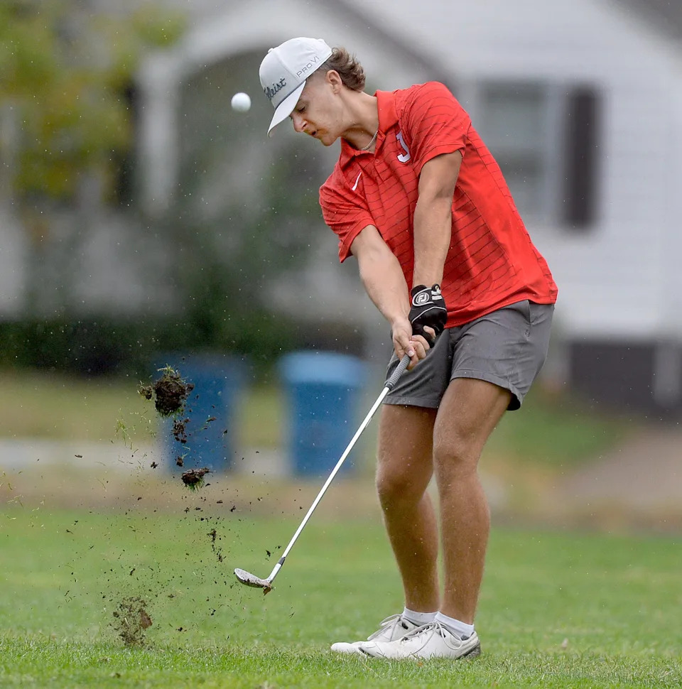 Jacksonville's A.J. Charpentier hits the ball toward the 16th green during the Central State Eight Conference boys golf meet at Bunn Golf Course Wednesday, Sept. 24, 2025.