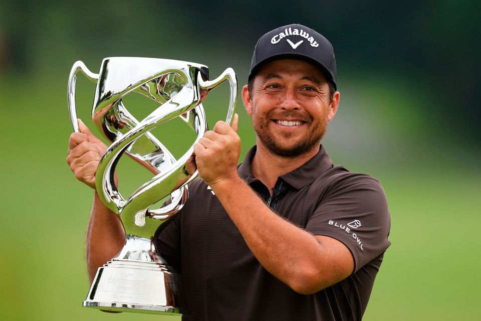 Xander Schauffele poses for a photo with his trophy after he won the Baycurrent Classic at the Yokohama Country Club in Yokohama, near Tokyo. Photo:Hiro Komae/AP
