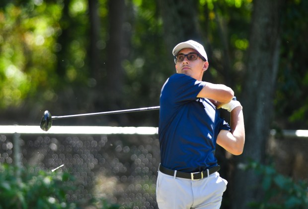 Dallas’ Ryan Roman tees off on the 16th hole at...