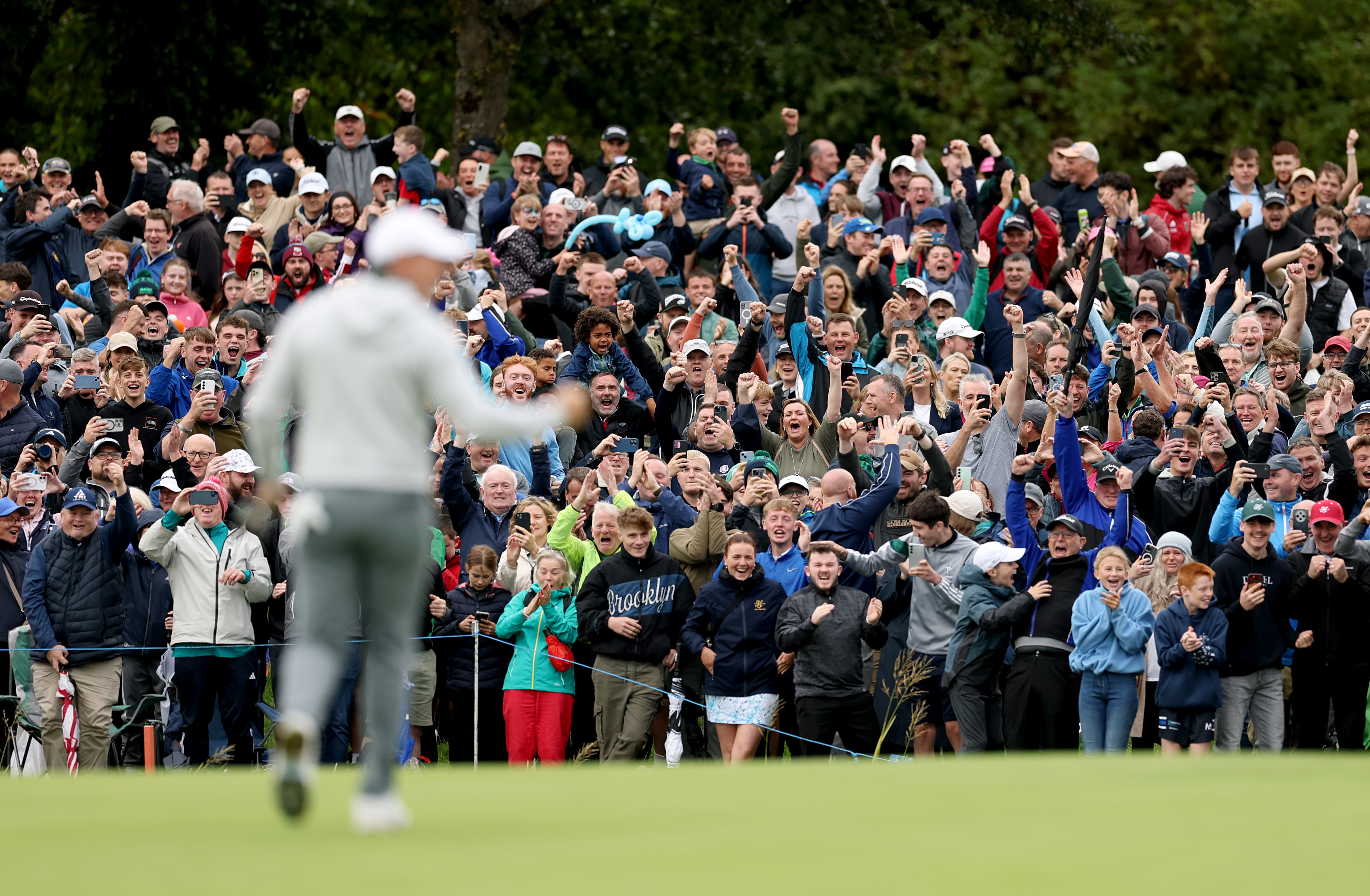 Rory McIlroy fist pumps after holing an eagle putt