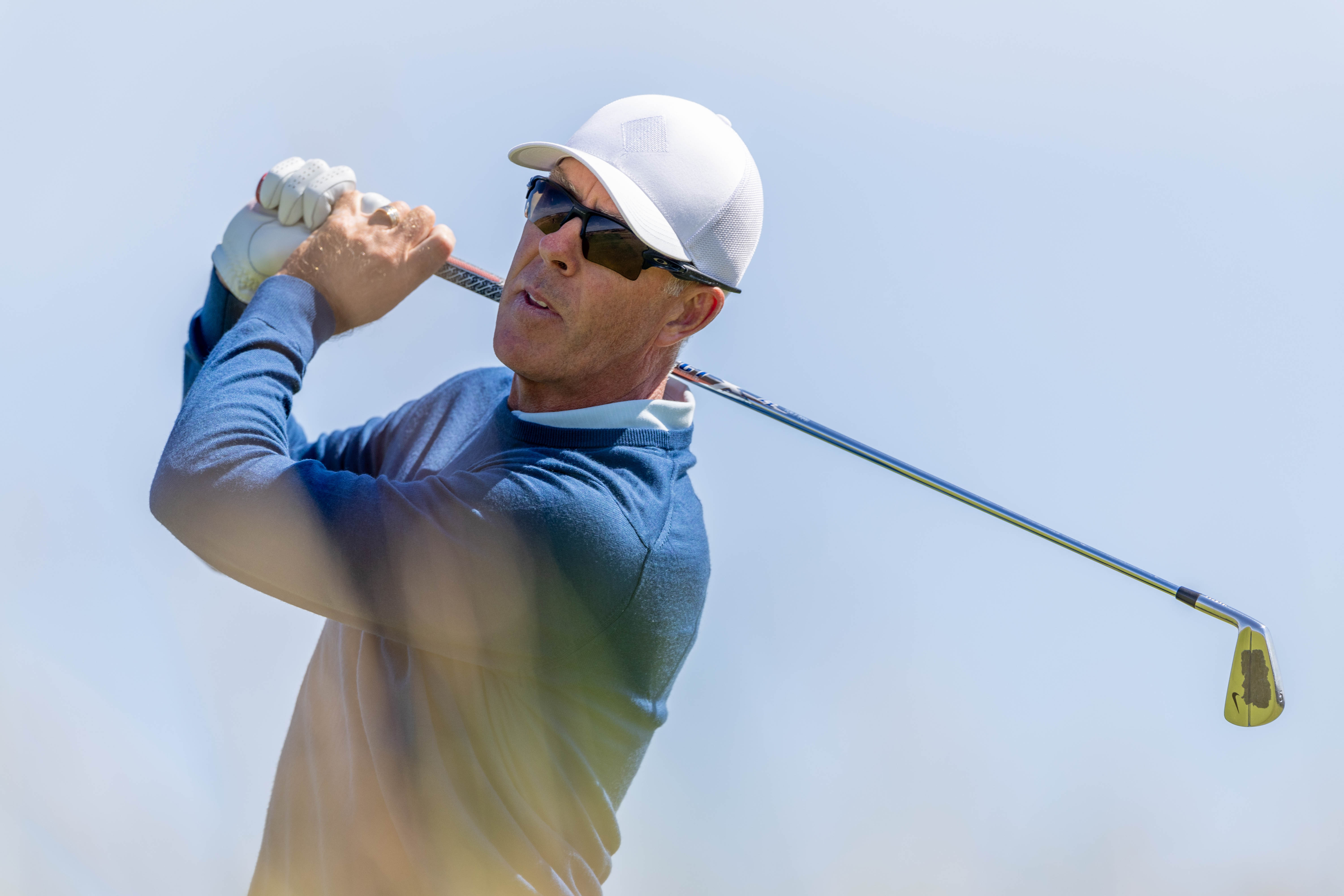 Richard Green hits an iron shot