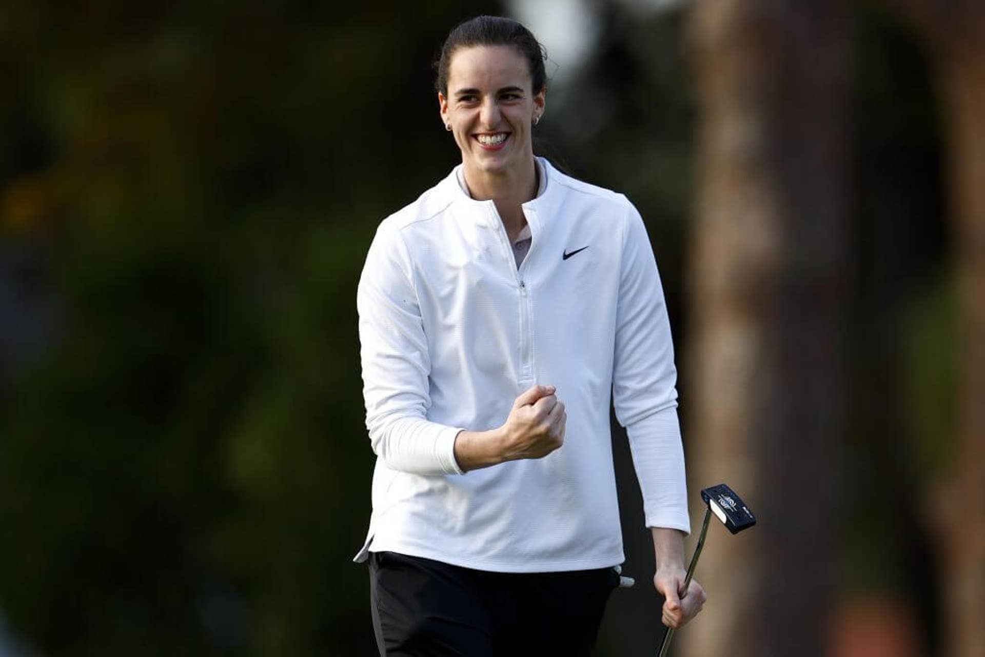 Caitlin Clark pumps her right fist on the fifth hole prior to The Annika at Pelican Golf Club on Nov. 13, 2024, in Belleair, Fla.