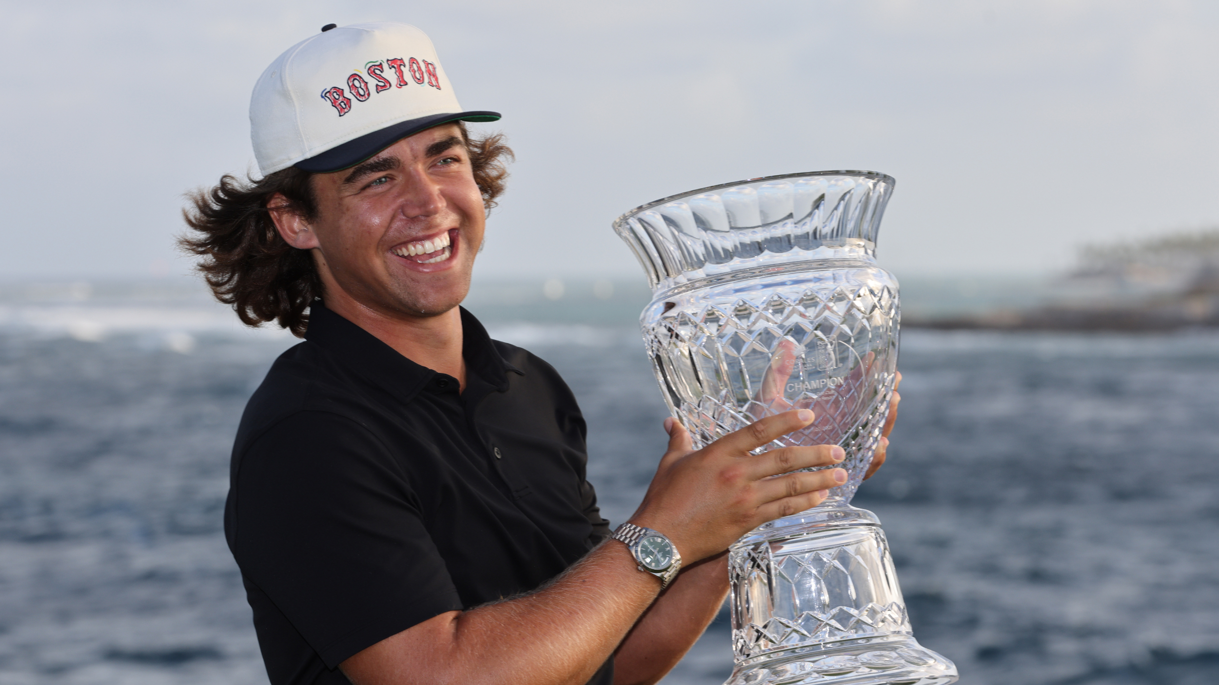 Garrick Higgo with the Corales Puntacana Championship trophy