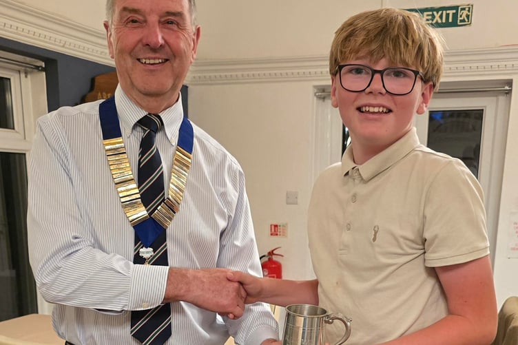 Leo Roberts receives his trophy