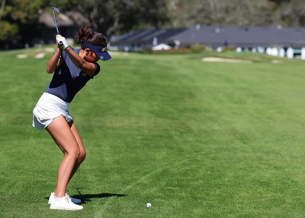 UC Santa Cruz’s Olivia Lew hits from the sixth fairway...
