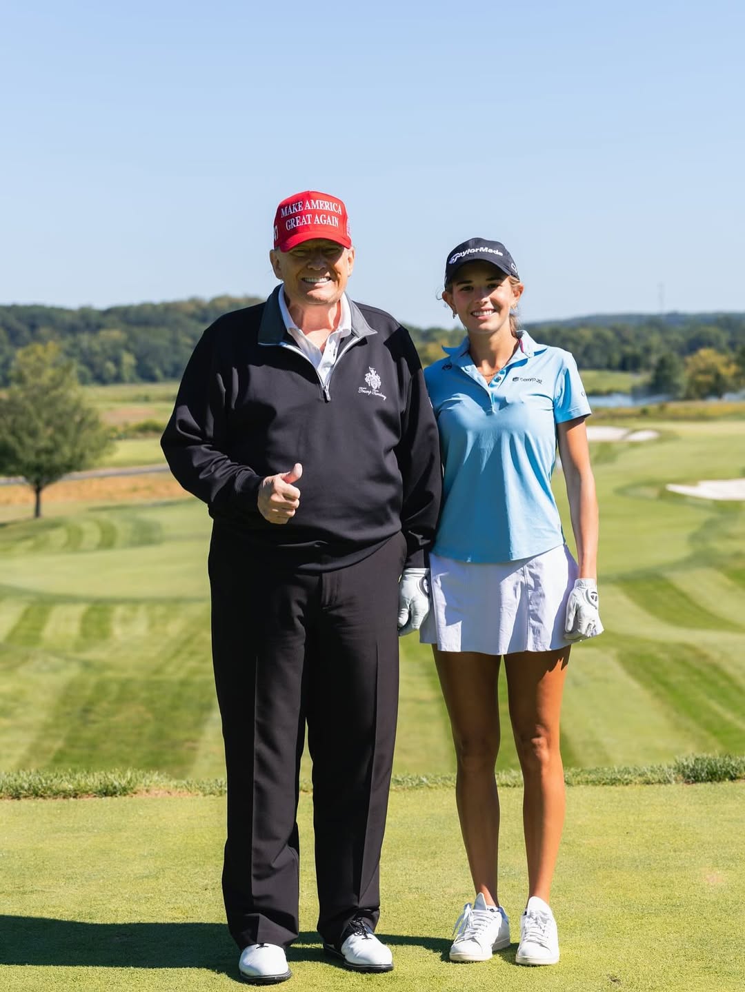 Donald Trump poses with granddaughter Kai Trump on a golf course during the filming of her YouTube series “1 on 1 with Kai.”