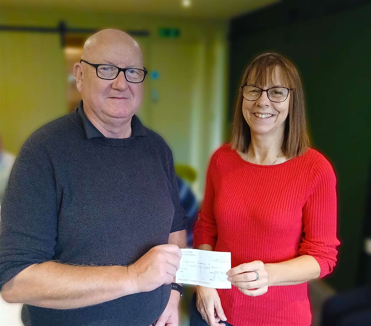 The Suffolk Golf Club captain Perry Garrod presented a cheque to Shaftesbury Picture: Perry Garrod