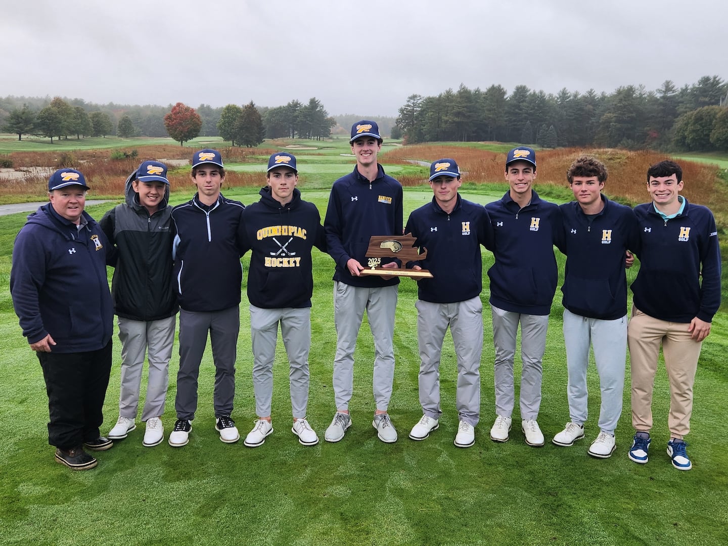 Coach John Doherty and his Hanover golf team collected the hardware after capturing the Division 2 South title at LeBaron Hills CC, the program's first in a decade.