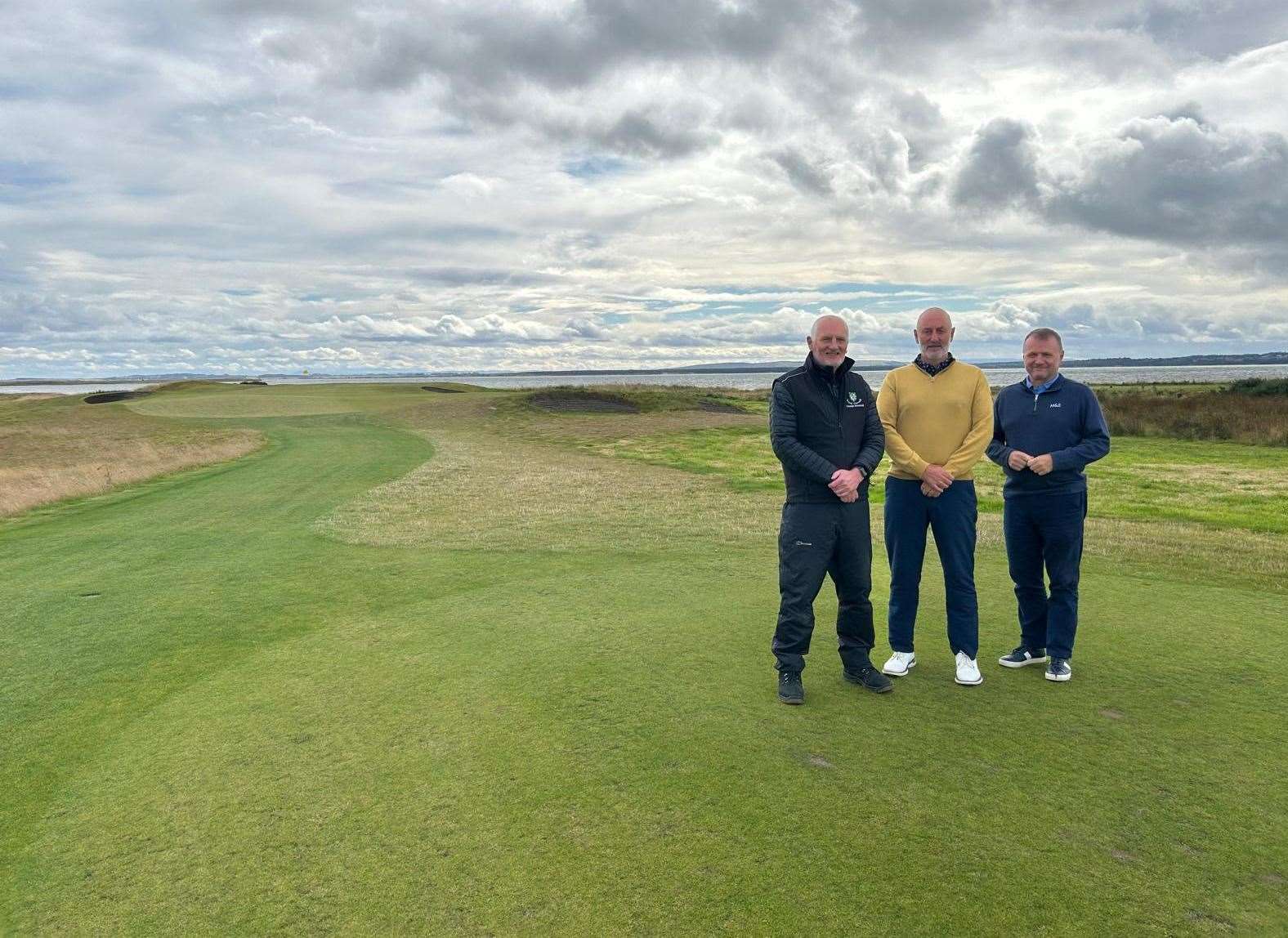 Eoin Riddell, Gary Bethune and Tom Mackenzie look over the new 9th hole on Royal Dornoch's Struie Course