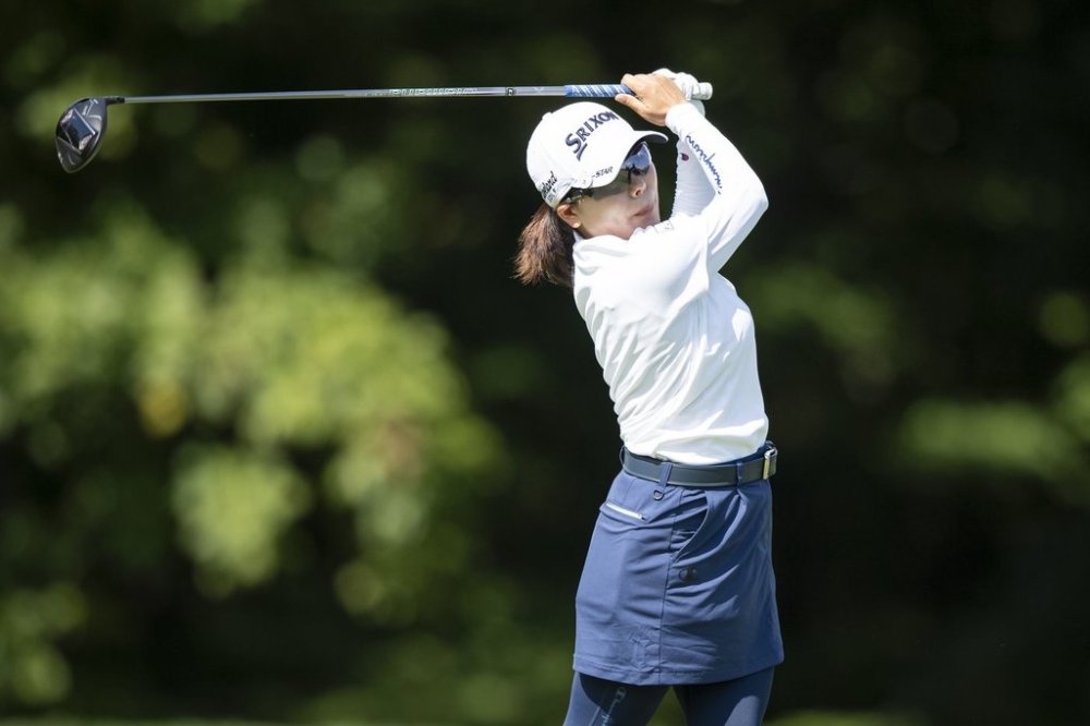 Minami Katsu, of Japan, tees off on the ninth hole during the first round of the Kroger Queen City Championship golf tournament, Thursday, Sept. 11, 2025, at TPC River's Bend in Cincinnati. (AP Photo/Tanner Pearson)