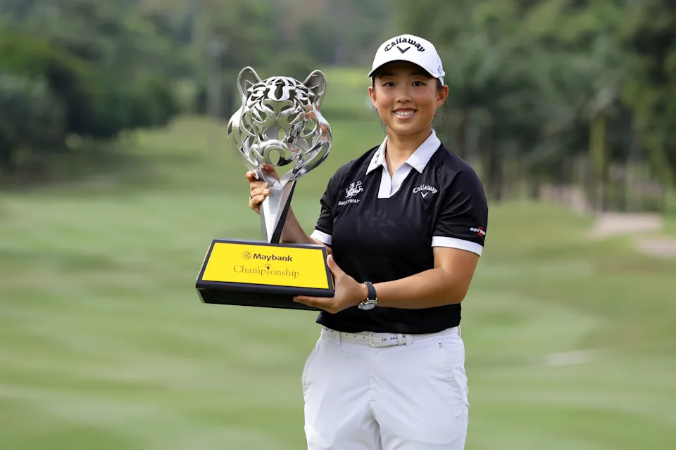 Ruoning Yin poses with the trophy after winning the 2024 Maybank Championship at Kuala Lumpur Golf & Country Club in Kuala Lumpur, Malaysia.