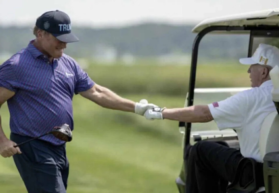 President Trump playing golf with Jon Gruden.