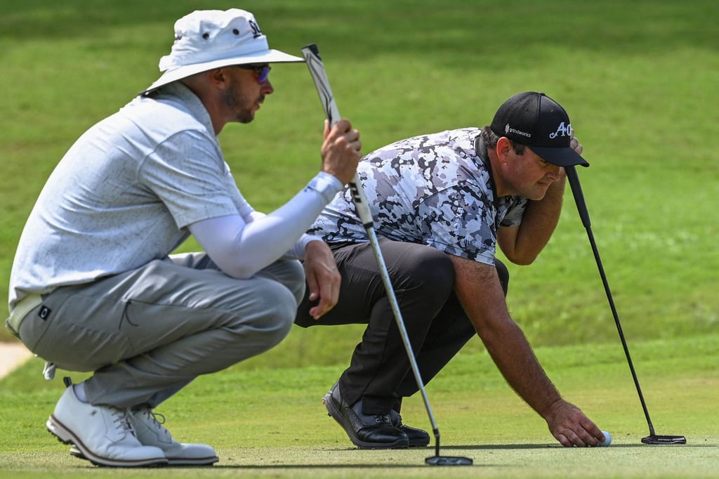 Patrick Reed (right) rued missing “a ton of putts” at last week’s International Series Philippines event. Photo: AFP Patrick Reed (right) rued missing “a ton of putts” at last week’s International Series Philippines event. Photo: AFP