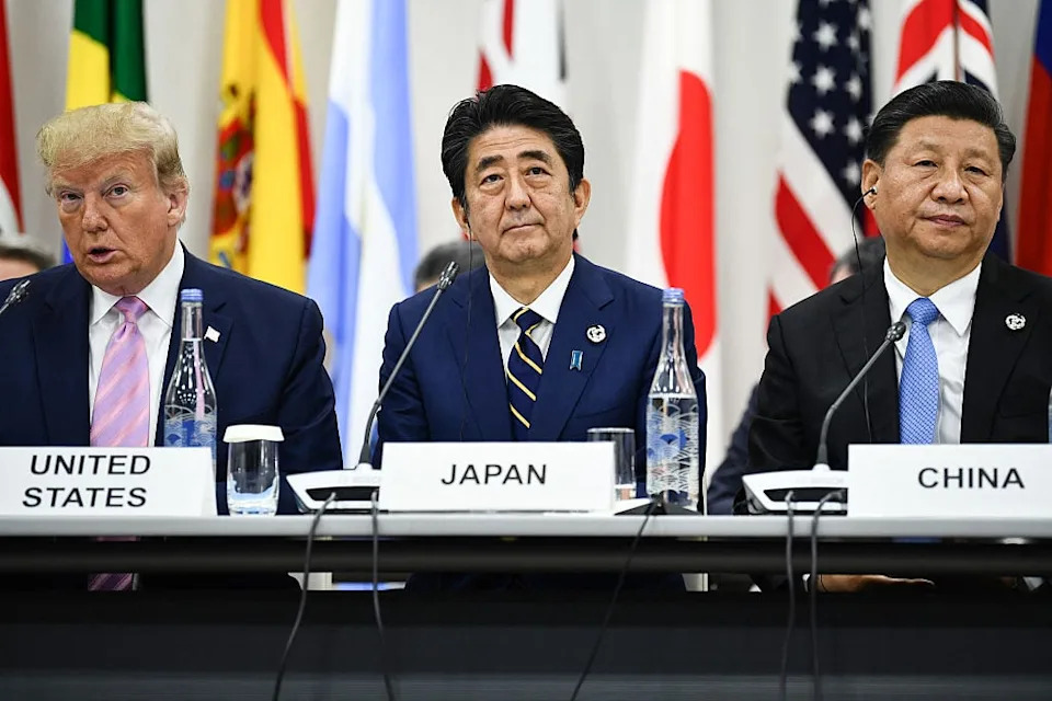 US President Donald Trump, Japan's Prime Minister Shinzo Abe and China's President Xi Jinping attend a meeting at the G20 Summit in Osaka on June 28, 2019. / BRENDAN SMIALOWSKI / AFP via Getty Images