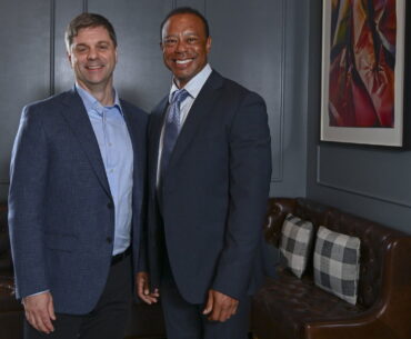 Brian Rolapp and Tiger Woods