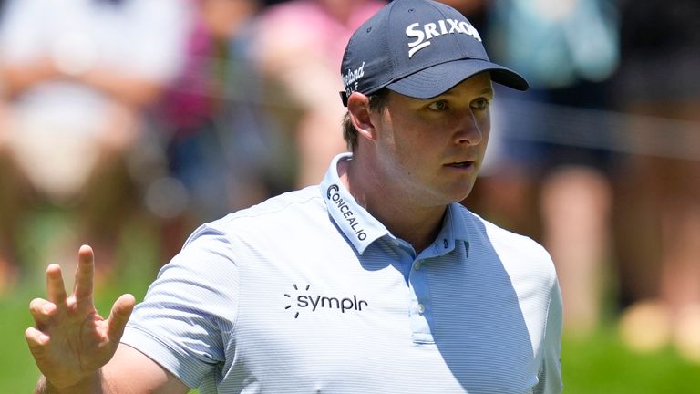 Sepp Straka, of Austria, reacts after making his putt on the ninth hole during the final round of the John Deere Classic golf tournament, Sunday, July 9, 2023, at TPC Deere Run in Silvis, Ill. (AP Photo/Charlie Neibergall)