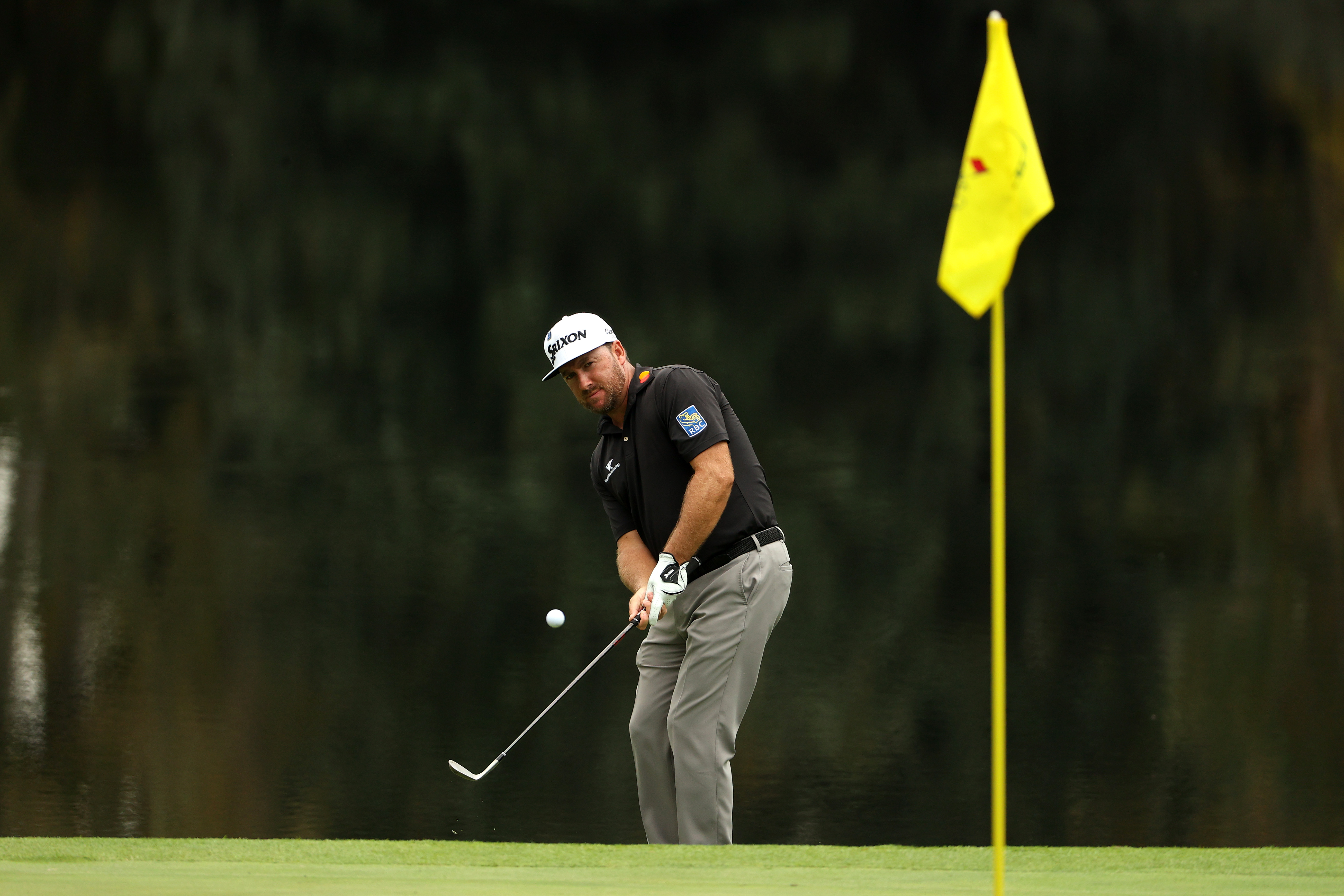 Graeme McDowell hits a chip shot at The Masters in 2020