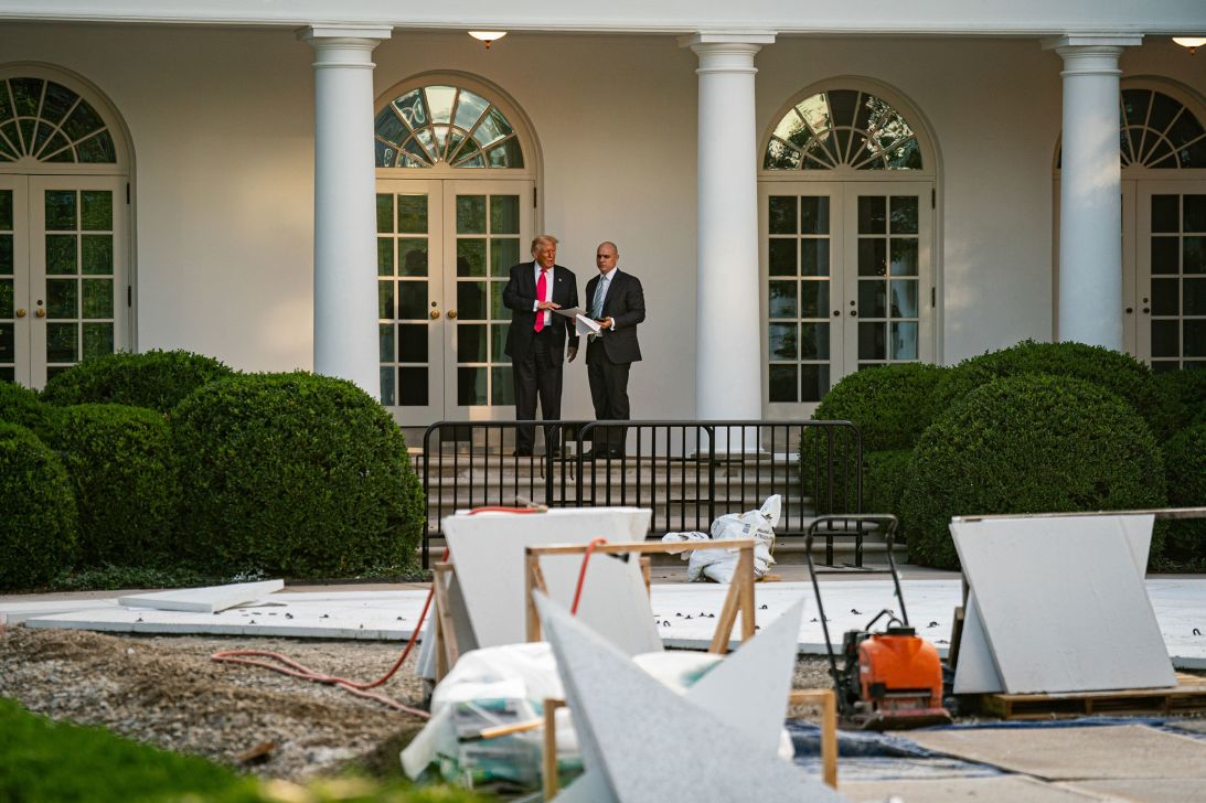 President Donald Trump and James Blair, the White House deputy chief of staff for legislative, political and public affairs, view renovations to the Rose Garden on July 15.