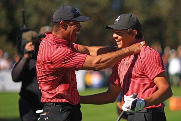 Tiger Woods celebrates his son Charlie's hole-in-one