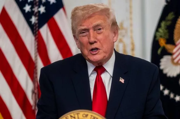 PALM BEACH, FLORIDA - NOVEMBER 27: President Donald Trump participates in a call with U.S. service members from his Mar-a-Lago club in Florida on Thanksgiving Day on November 27, 2025 in Palm Beach, Florida. (Photo by Pete Marovich/Getty Images)