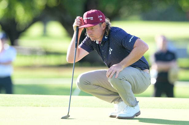 Cam Smith of Australia lines up a putt on the eleventh green on day one of the BMW Australian PGA Championship 2025 at Royal Queensland Golf Club on November 27, 2025 in Brisbane, Australia