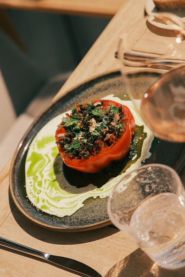 The Country Club, which has an old bobsleigh and relics from Winter Olympics past hanging from its ceiling also welcomes guests in the evening and here we sat down to enjoy an enormous platter of T-bone steaks, braised lamb and grilled chicken