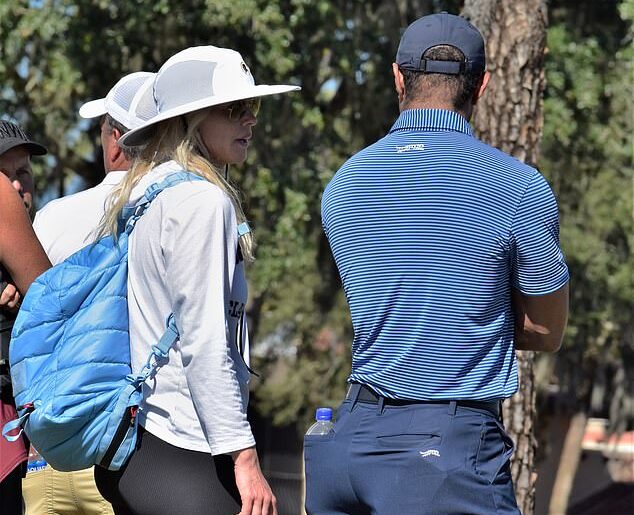 Tiger Woods and ex-wife Elin Nordegren chatted as they supported son Charlie on Saturday