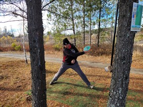 Colleen McInnes winds up to deliver at the Nickel City Open Disc Golf Tournament in Coniston.