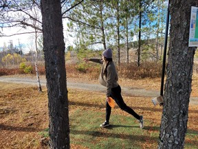 Alicia Hums had a hand in designing the third disc golf course in Sudbury. Here she lines up her shot at the Nickel City Open Disc Golf Tournament in Coniston