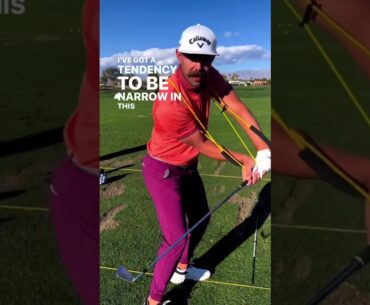 Erik van Rooyen dialing in his swing on the range with the help of the GravityFit TPro.