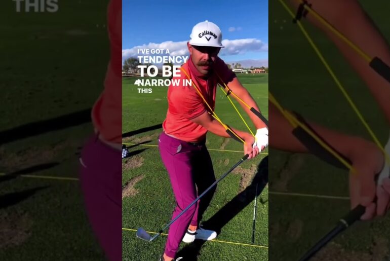 Erik van Rooyen dialing in his swing on the range with the help of the GravityFit TPro.