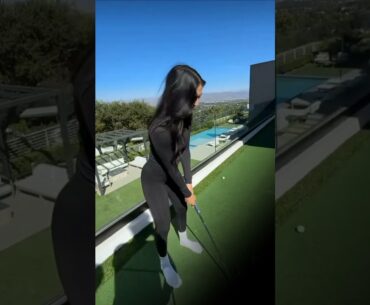 Bella plays golf with David Dobrik