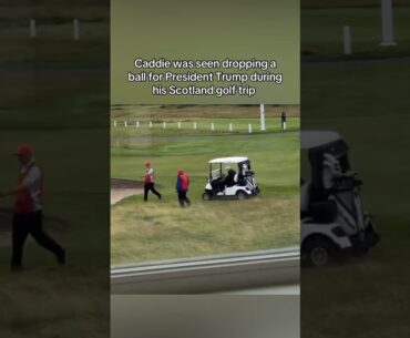 Caddie drops a ball for President Trump during golf trip