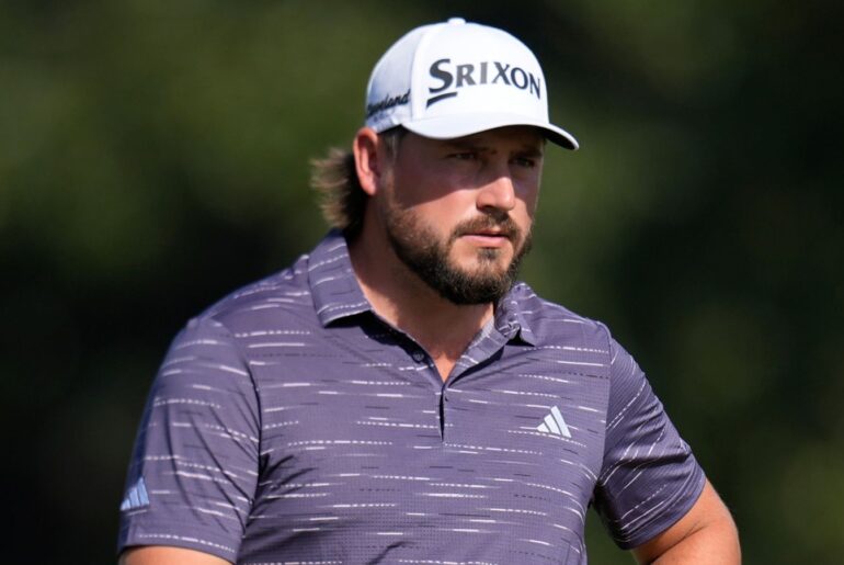 Andrew Novak waits to putt on the nineth green during the second round of the RSM Classic golf tournament, Friday, Nov. 21, 2025, in St. Simons Island, Ga. (AP Photo/Mike Stewart)