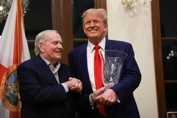 WEST PALM BEACH, FLORIDA - MARCH 24: Retired professional golfer Jack Nicklaus presents Republican presidential candidate and former President Donald Trump with the 2024 Trump International Golf Club Most Improved Player award on March 24, 2024, in West Palm Beach, Florida. Donald Trump is expected to be in New York in the morning for a court appearance in his Manhattan criminal prosecution case. (Photo by Joe Raedle/Getty Images)