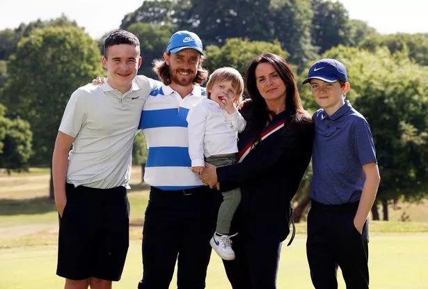Tommy Fleetwood of England with his family  L-R  Oscar, Tommy Fleetwood, Frankie, wife Clare and Murray after his practice session at Sandiway Golf Club