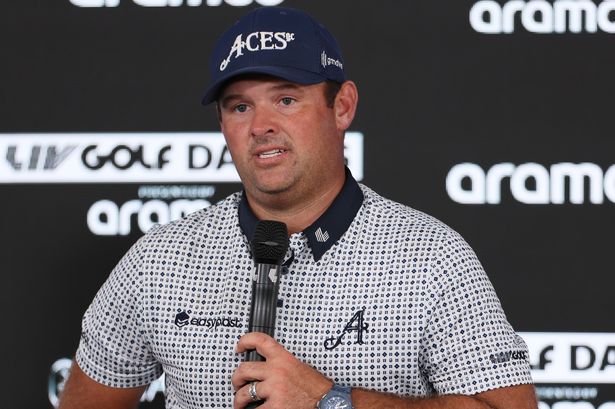 Patrick Reed speaks at a press conference