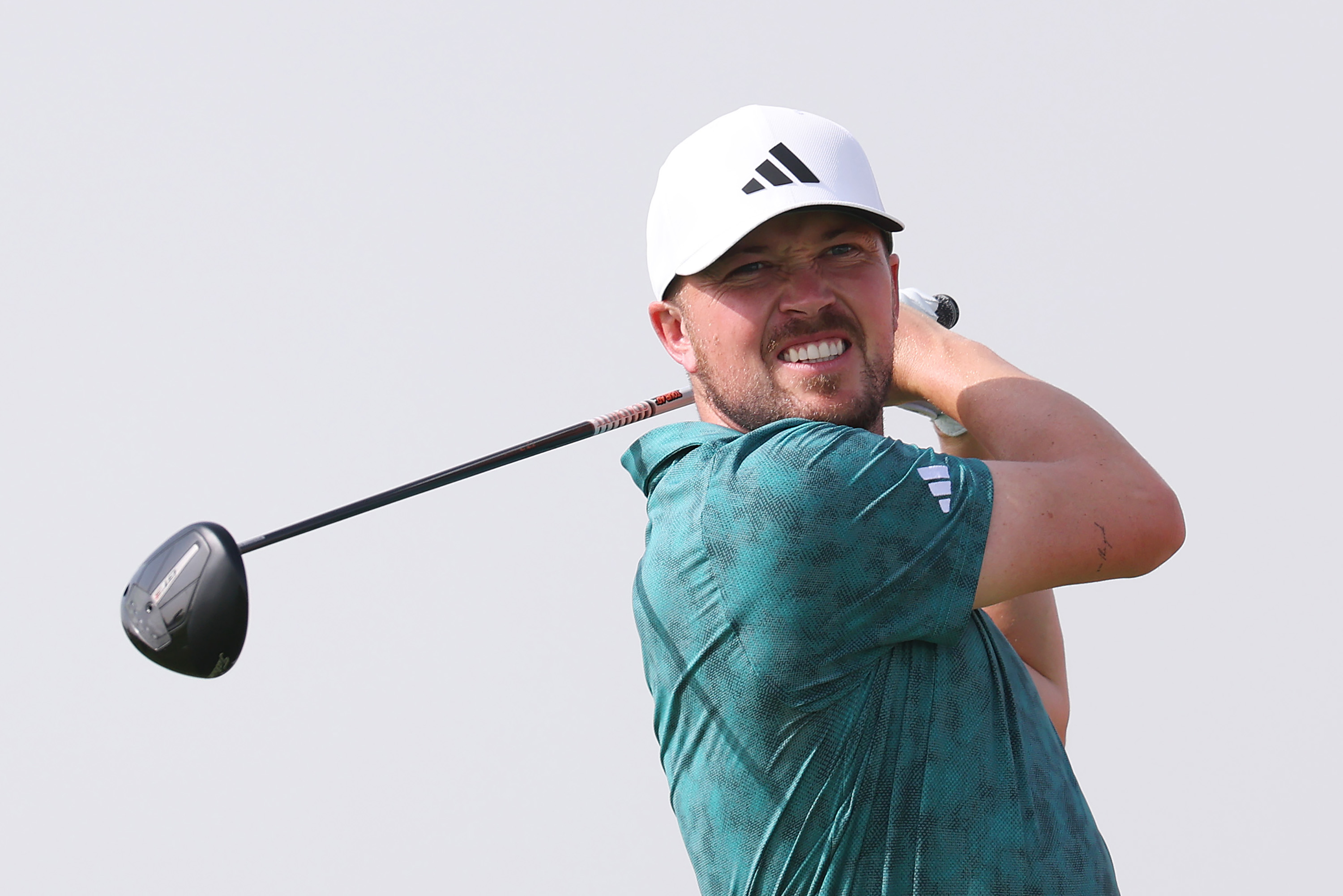 Richard Mansell hits a driver