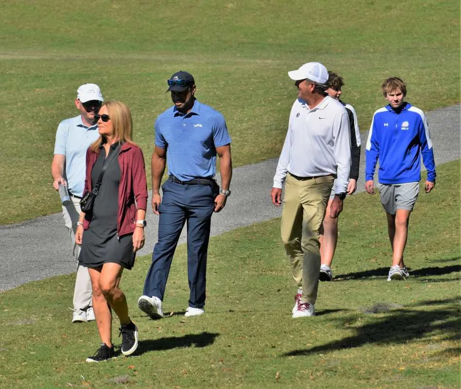 Tiger Woods walks alongside Florida State golf head coach Trey Jones as they watch Charlie Woods compete at the Class 1A state championship on Nov. 15, 2025. Alexander Peterman / The Palm Beach Post / USA TODAY NETWORK via Imagn Images