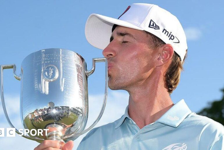 David Puig kissing the Australian PGA Championship trophy
