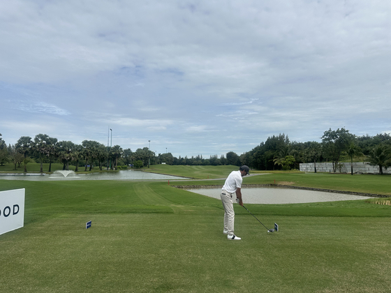 Teeing off on the 10th on the East Course at Vattanac Golf Resort  [JIM BULLEY]