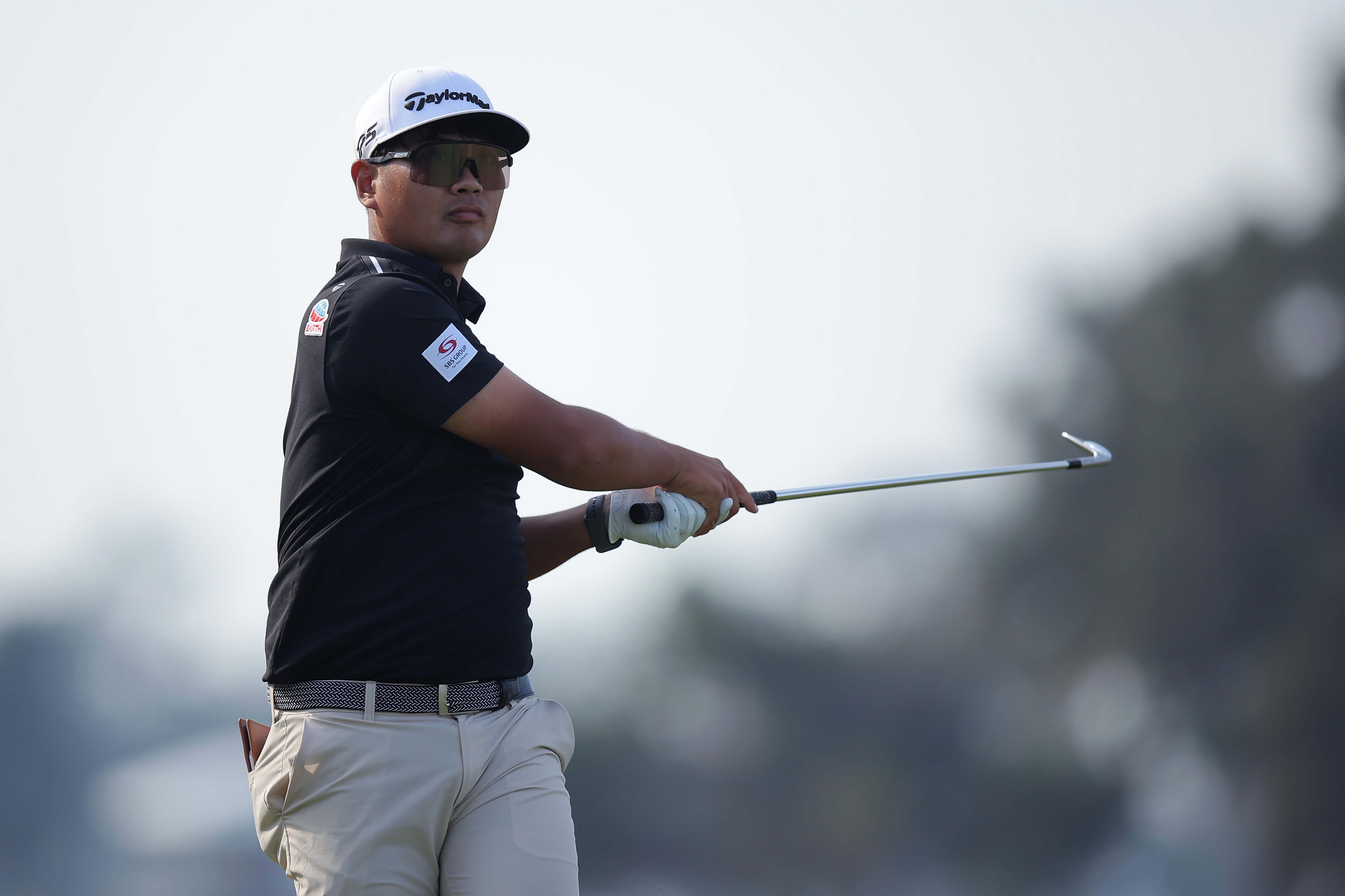 Ryo Hisatsune hits an iron shot