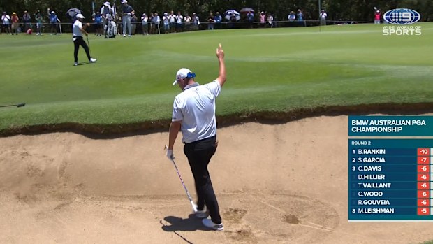 Marc Leishman sinks an incredible eagle chip-in from the bunker.