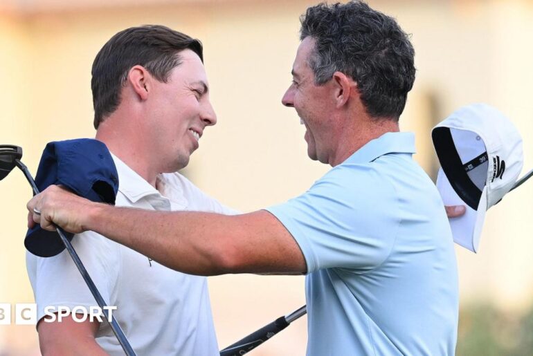 Matt Fitzpatrick and Rory McIlroy embrace after the Englishman defeated the Northern Irishman in a play-off to win the DP World Tour Championship.