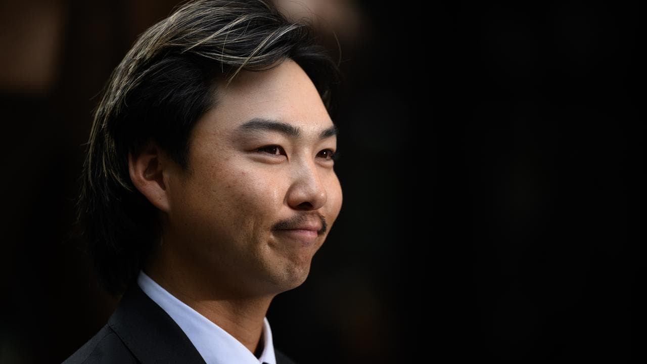 Australian golfer Min Woo Lee poses