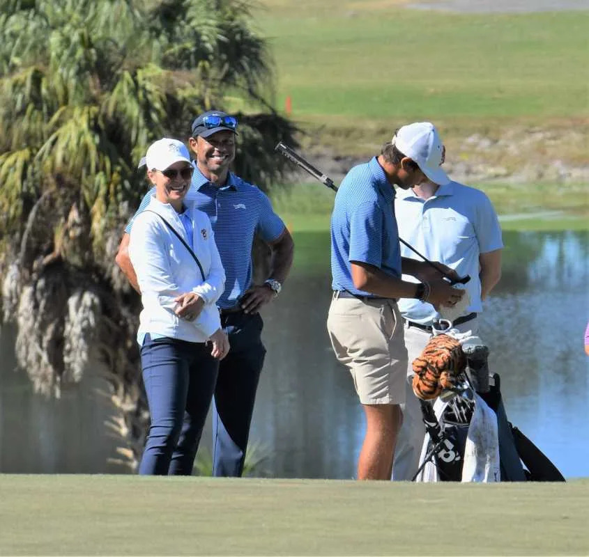 Tiger Woods is all smiles as he watches his son Charlie Woods play for Benjamin School during the Class 1A state championship on Nov. 15, 2025. Alex Peterman / The Palm Beach Post / USA TODAY NETWORK via Imagn Images